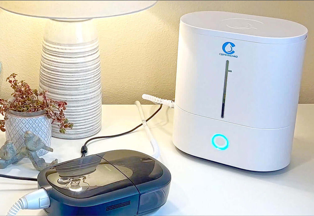 CSpring Mk2 Automatic CPAP Water Chamber System on white background, showcasing its sleek and user-friendly design